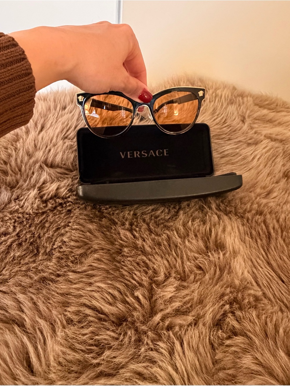 Versace Black Frame Sunglasses with Amber Lenses and Gold Medusa Accents